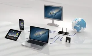 Tous outils informatiques figurant un caddie et un globe terrestre. Mondialisation par le e-marketing